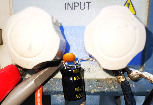 為什么紋波測試時示波器要并聯電解和瓷片電容